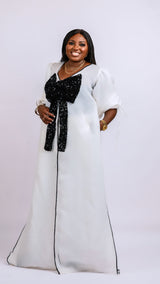 White kimono with black bow sequin and white wide leg pants Look 17