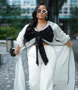 White kimono with black bow sequin and white wide leg pants Look 17